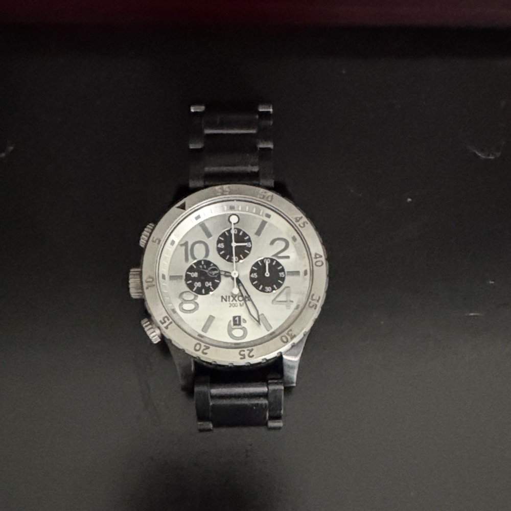 41-30 Nixon two toned Black and Silver Chronograph Watch